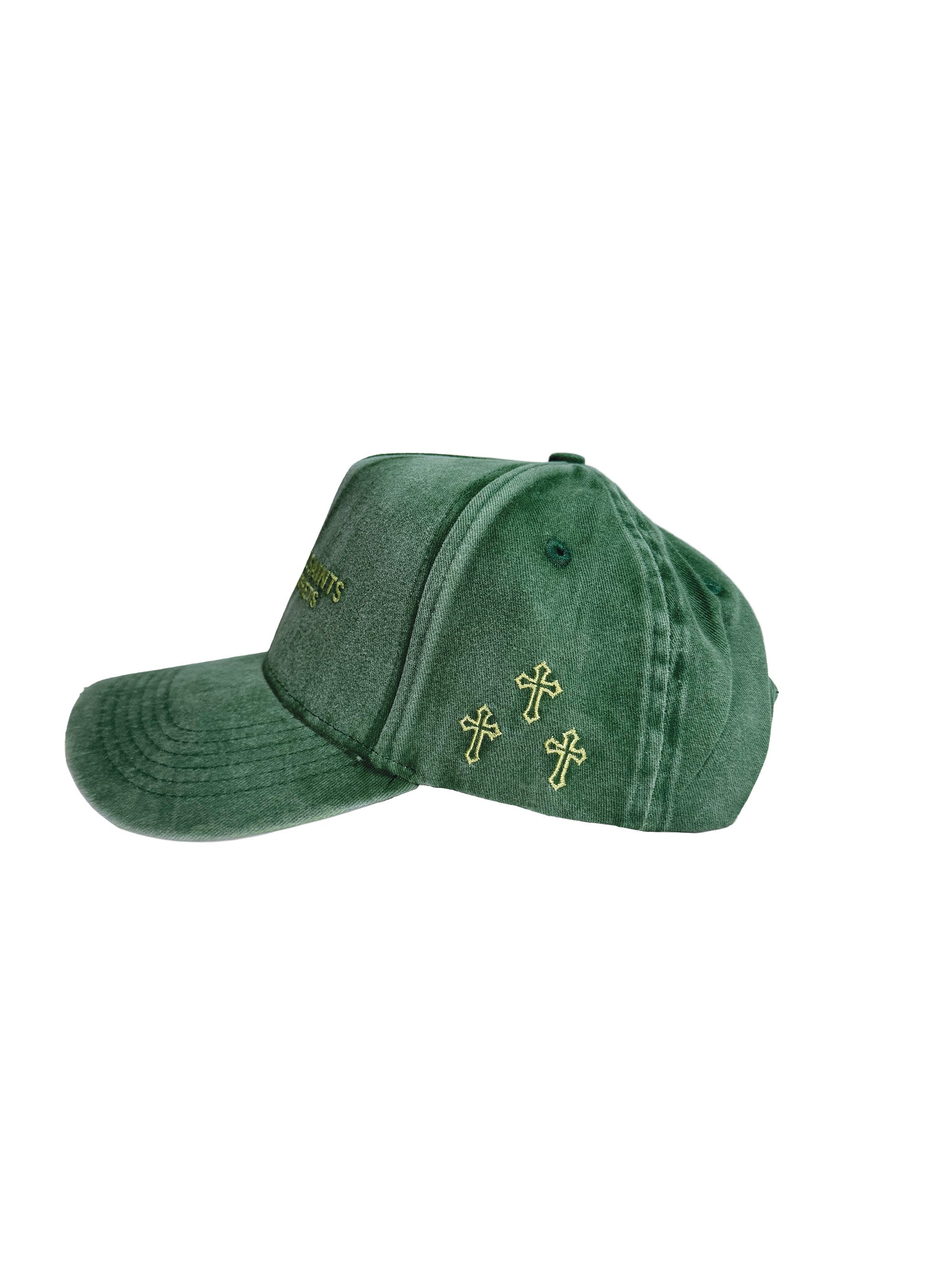 Above All Saints green washed snapback cap with yellow embroidered text reading 'ABOVE ALL SAINTS EMPTY PROPHETS' on the front