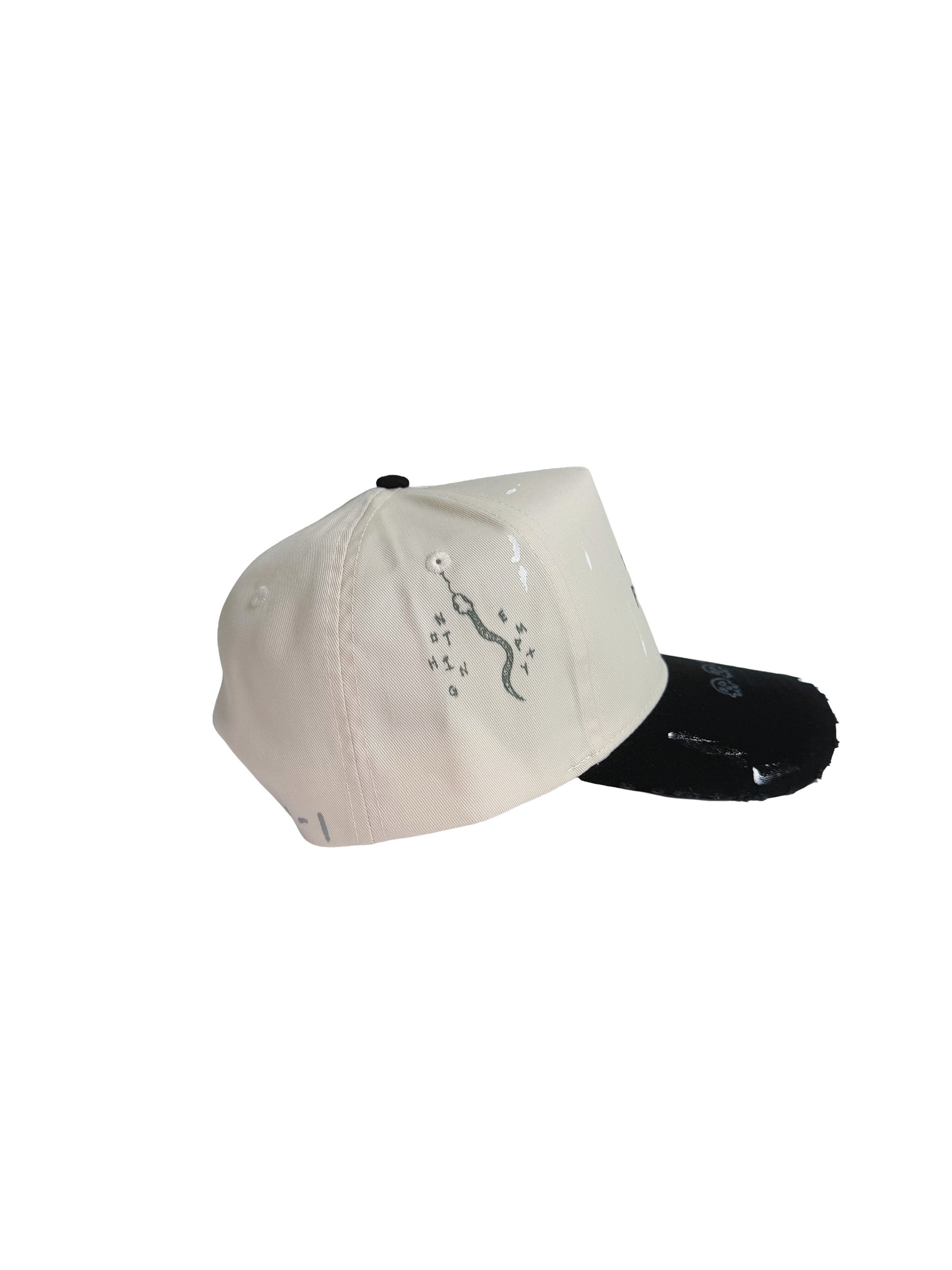 Snapback with a structured crown and a black brim, featuring the text 'EMPTY PROPHETS' in black on the front with 4 hand drawn skulls on the brim