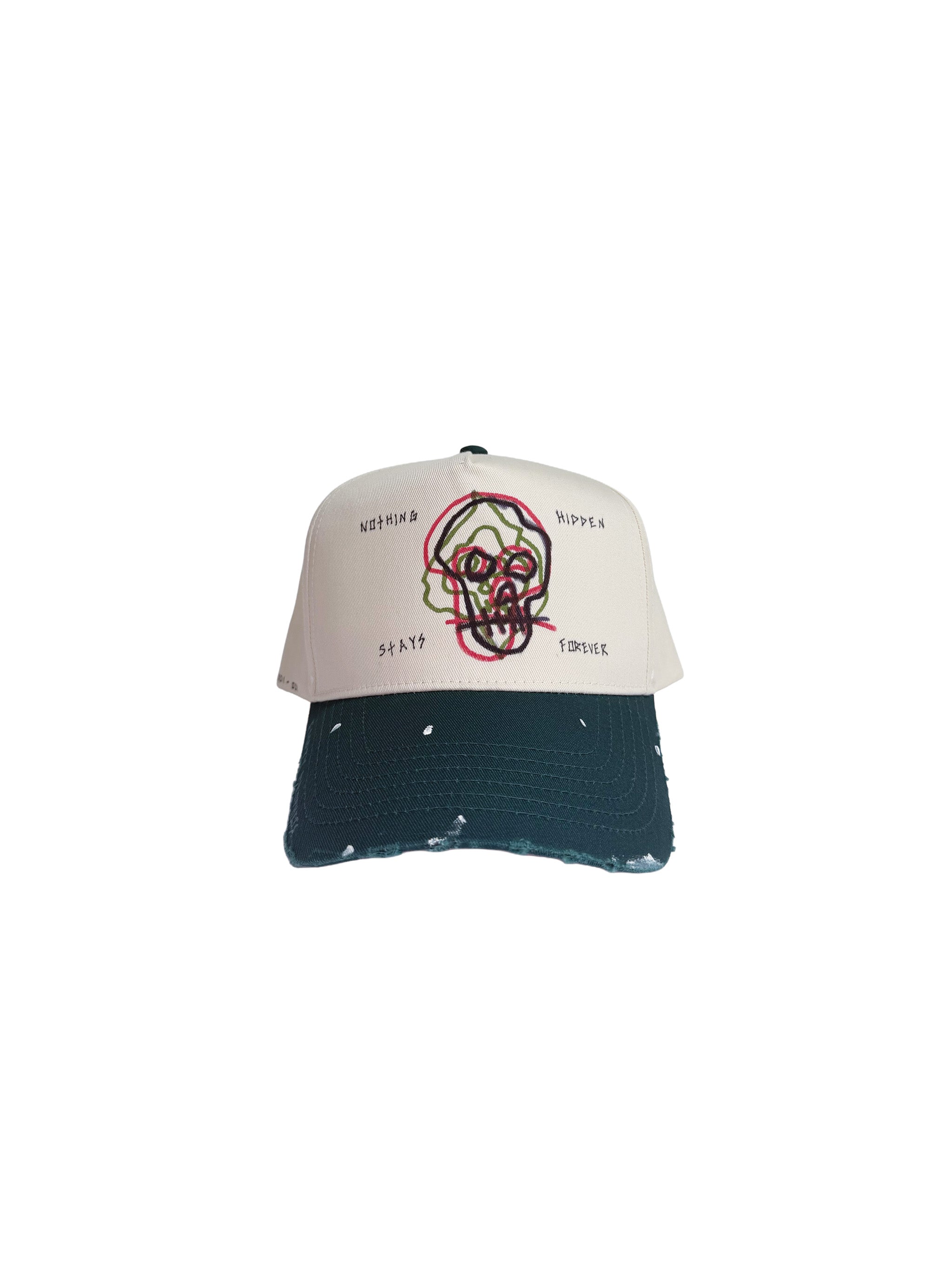 3 Skulls drawn on the front cap, showing complexity of life. Hand painted and Hand Distressed.